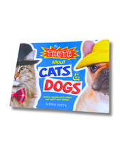 Load image into Gallery viewer, Book cover titled 'The Truth About Cats &amp; Dogs' with a cat and dog wearing hats on a blue background.