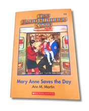 Load image into Gallery viewer, Book titled &#39;Mary Anne Saves the Day&#39; from The Baby-Sitters Club series on a white background