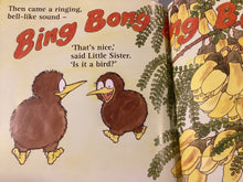 Load image into Gallery viewer, An open children's book page showing a colorful illustration of two fluffy brown birds facing each other under large red title text, with yellow fruit and green leaves on the right page.