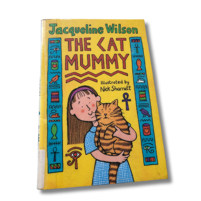 Book cover of 'The Cat Mummy' by Jacqueline Wilson with a child holding a cat on a yellow background.